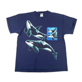 Navy blue t-shirt with orca whale design on a white background
