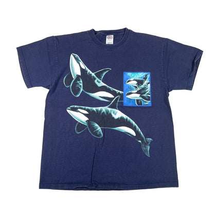 Navy blue t-shirt with orca whale design on a white background