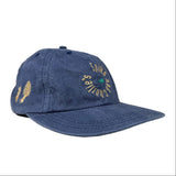 Blue cap with embroidered text and logos on a white background
