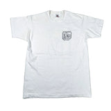 A white short-sleeve crewneck t-shirt with a small black graphic print on the left chest, laid flat on a light gray background.
