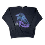 Black sweatshirt with a purple crow graphic and 'the Raven' text on a white background