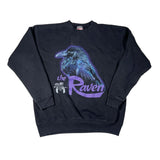 Black sweatshirt with a purple crow graphic and 'the Raven' text on a white background