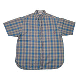 A short-sleeve plaid button-up shirt laid flat on a white background. The shirt features a blue and gray plaid pattern with a small red Levi's tag on the left chest pocket.
