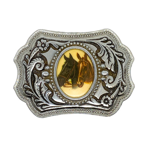 Decorative belt buckle with horse emblem on a white background