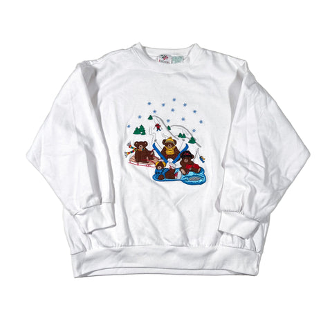 White shorts with cartoon bear design on a white background