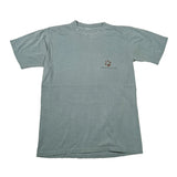 A faded sage green short-sleeve t-shirt with a small brown paw print and 'Yellowstone' text printed on the left chest, laid flat on a white background.