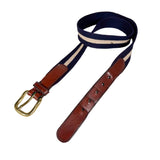 Navy belt with brown leather strap and brass buckle on a white background