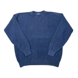 A classic blue crewneck knit sweater with a textured chevron pattern, laid flat on a white background.