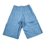 Blue denim shorts on a white background