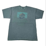 A faded blue-gray short-sleeve t-shirt with a graphic print of a rowboat on the chest, laid flat on a white background.