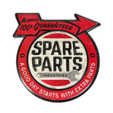 A vintage-style circular metal sign with a red and white design reading 'SPARE PARTS INDUSTRIES' and 'ALWAYS 100% GUARANTEED' on a white background.