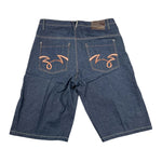 Blue denim shorts with orange designs on a white background