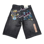 Denim shorts with colorful patches on a white background