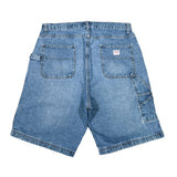 Blue denim shorts on a white background