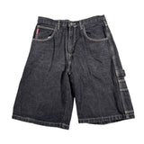 Pair of dark blue denim shorts on a white background