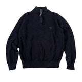 Black half-zip sweater on a white background