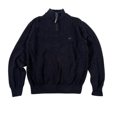 Black half-zip sweater on a white background