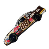 A die-cut embroidered patch shaped like a race car, featuring the number 88 and various sponsor logos including Goodyear, Firestone, and Mobil 1, displayed on a white background.