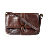 Brown leather shoulder bag on a light gray background