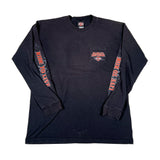 Black long-sleeve shirt with red and orange text on sleeves and chest pocket, on a white background