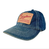 A blue denim baseball cap with white contrast stitching and a tan leather patch on the front featuring the brand name 'Denimfears'.