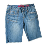 Blue denim shorts with a brand label on a white background