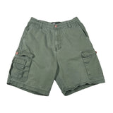 Green cargo shorts on a white background