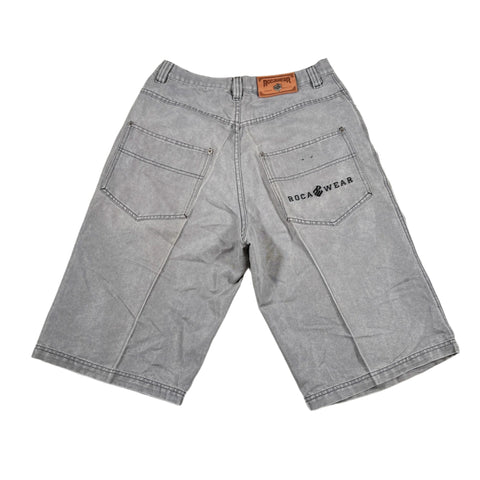 Gray shorts with a brand label on a white background