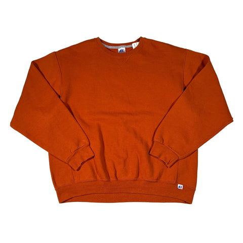 Orange sweatpants on a white background