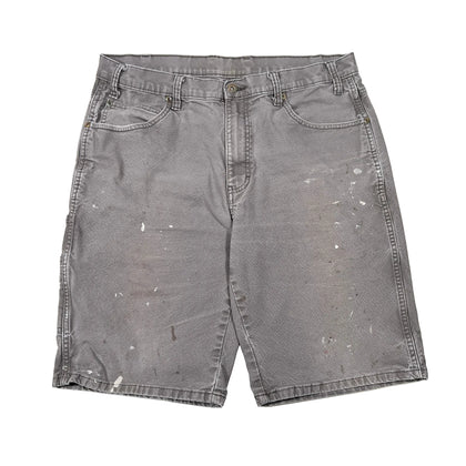 Gray denim shorts with visible wear on a white background