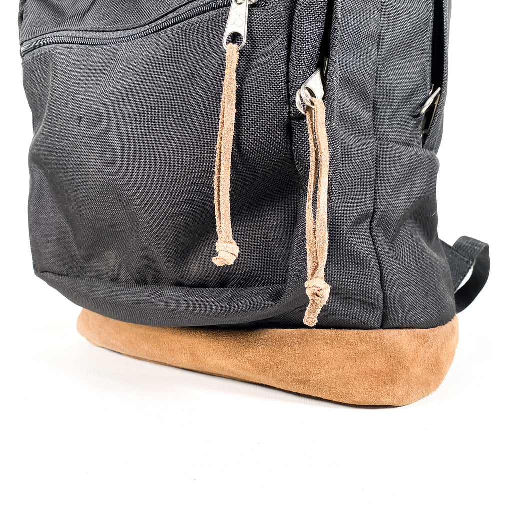 black backpack with brown leather bottom Modern Y2K Jansport Leather Bottom Black Backpack – CobbleStore Vintage