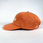orange polo hat